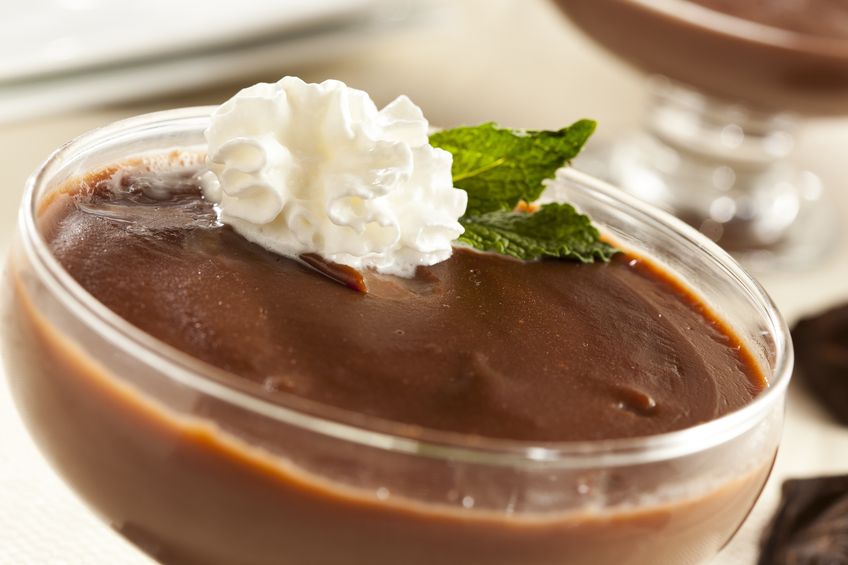 19004849 hot homemade chocolate pudding with whipped cream